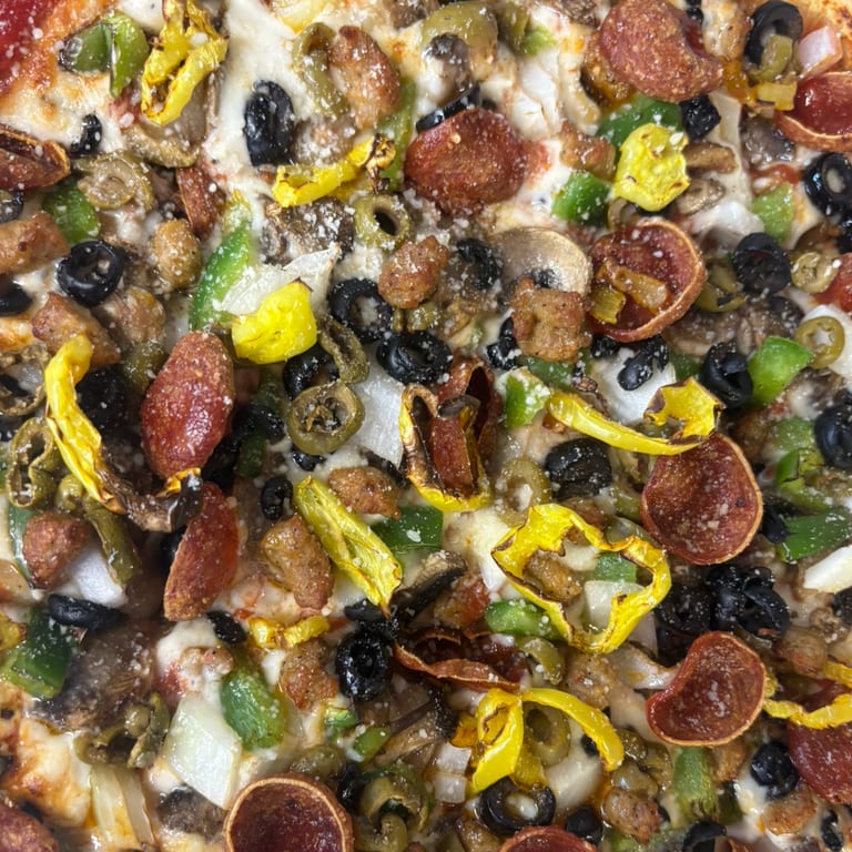 Indulge in Our Supreme Pizza